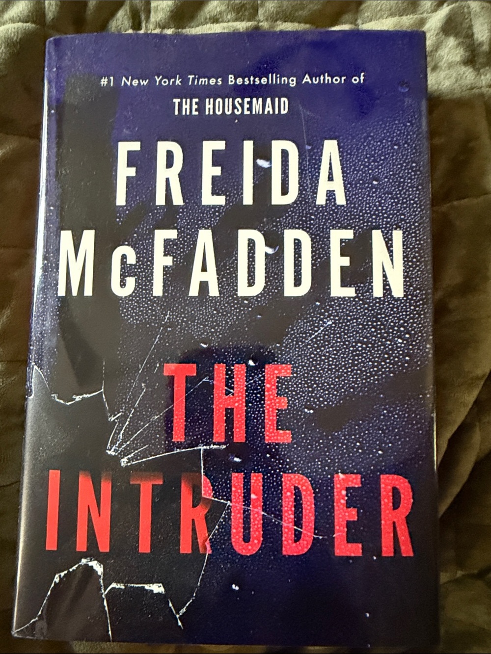 The Intruder - Navy & Red Hardcover